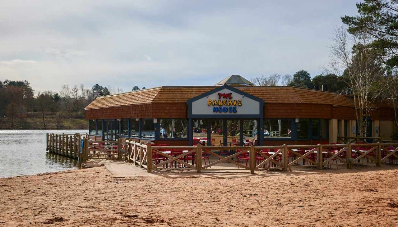 Exterior of The Pancake House beside the lake and the beach
